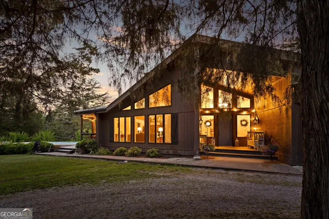 a view of a park with large trees