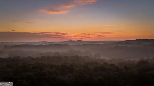 a white bath tub sitting in front of a window