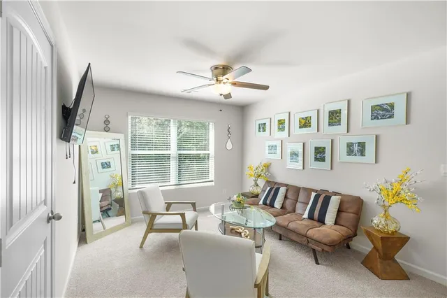 a bedroom with a bed and a mirror