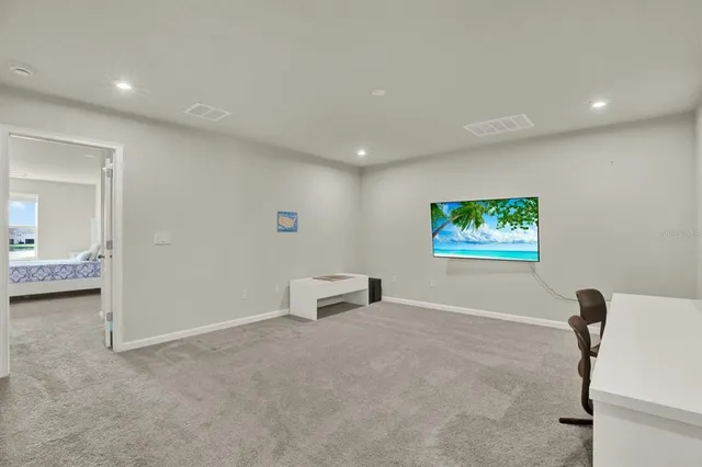 a view of a livingroom with furniture