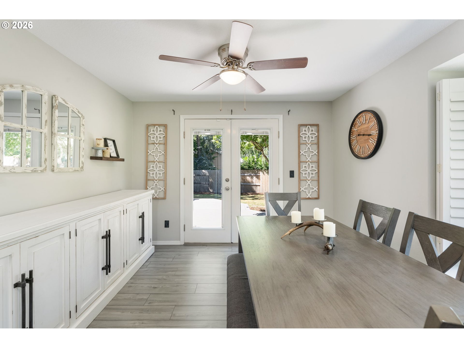 14877 Southwest Oregon Trail Lane Beaverton, OR 97006 - Photo 11 of 41 a open kitchen with a table and chairs