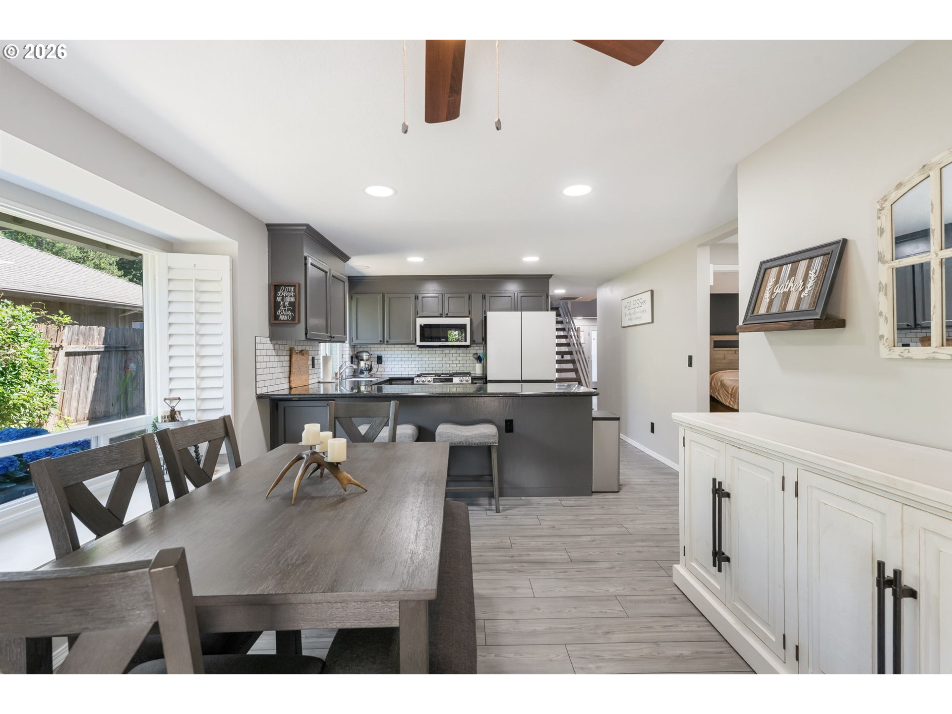 14877 Southwest Oregon Trail Lane Beaverton, OR 97006 - Photo 12 of 41 a kitchen with counter top space cabinets and appliances