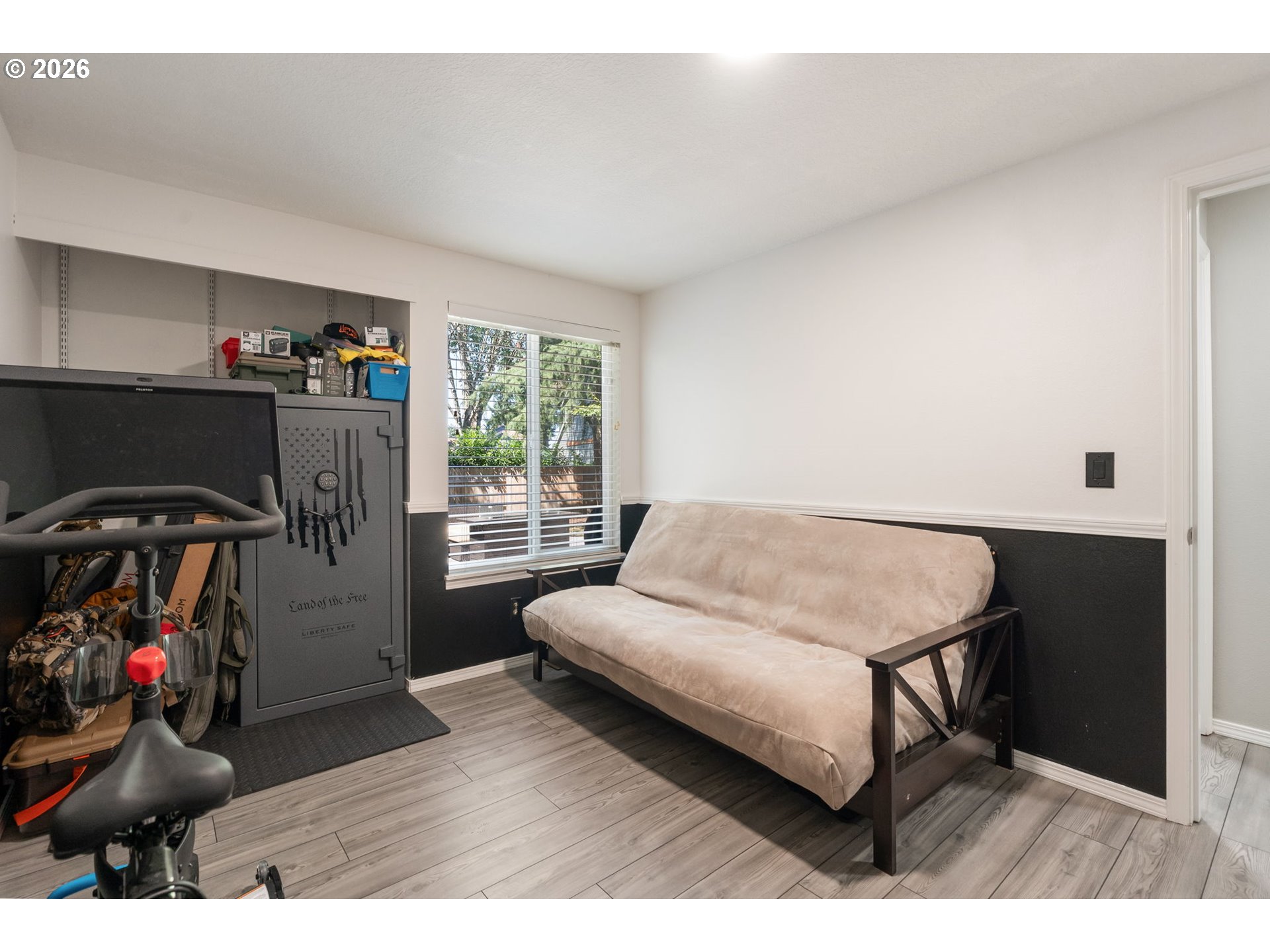 14877 Southwest Oregon Trail Lane Beaverton, OR 97006 - Photo 22 of 41 a living room with furniture and a wooden floor