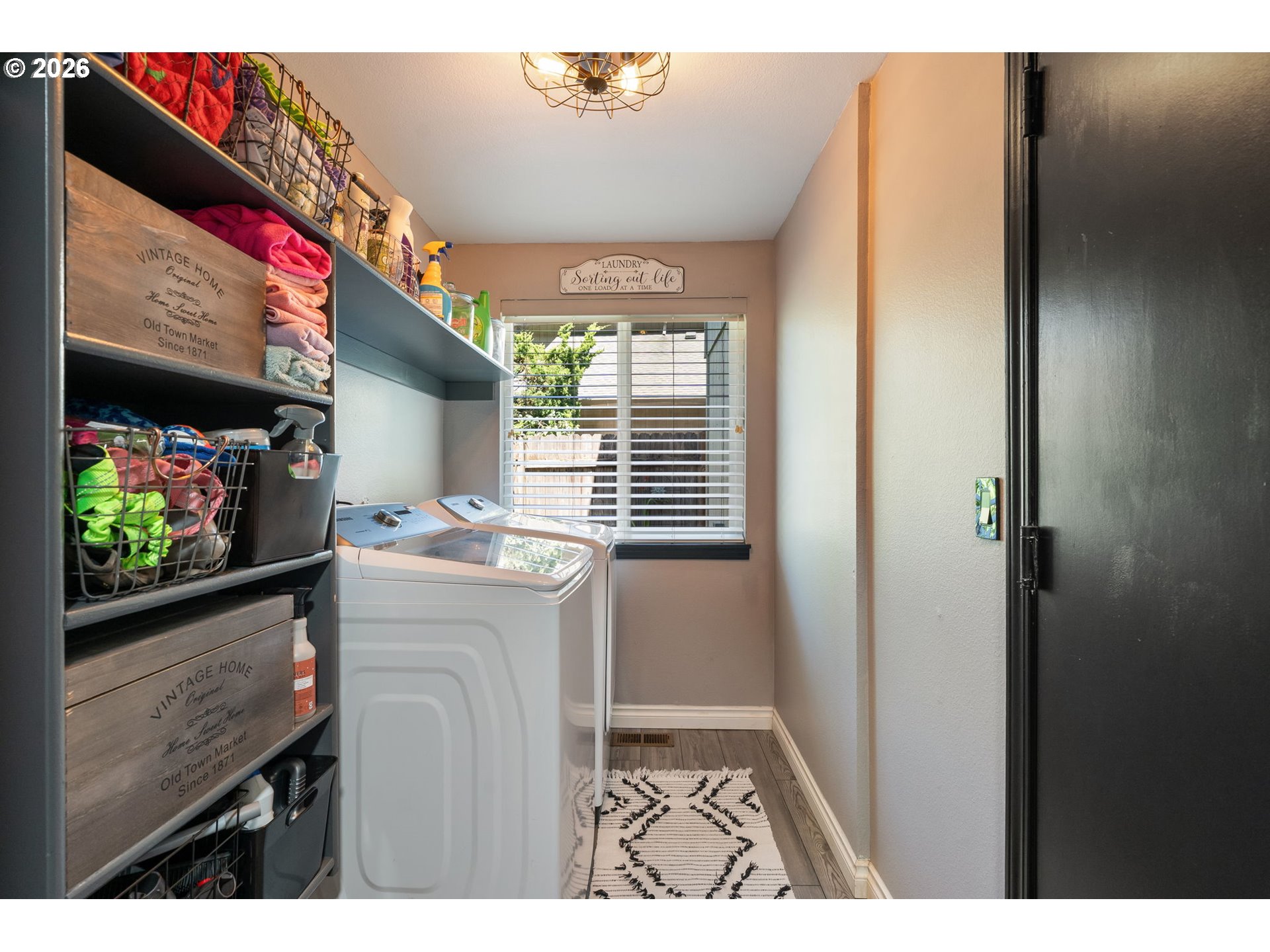 14877 Southwest Oregon Trail Lane Beaverton, OR 97006 - Photo 33 of 41 a utility room with dryer and washer