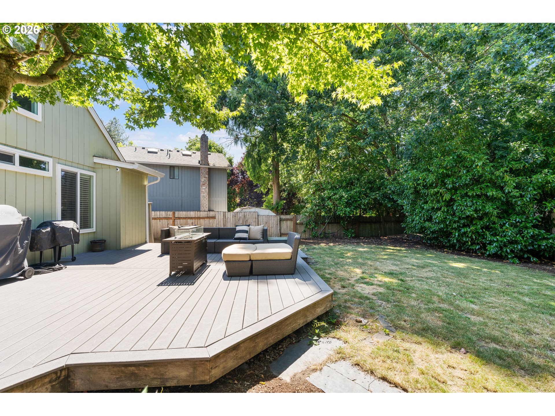 14877 Southwest Oregon Trail Lane Beaverton, OR 97006 - Photo 36 of 41 a view of a backyard with sitting area
