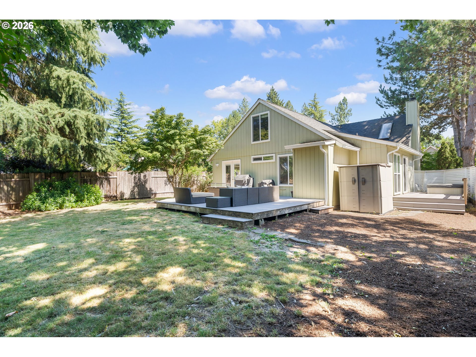 14877 Southwest Oregon Trail Lane Beaverton, OR 97006 - Photo 38 of 41 a view of a house with a yard