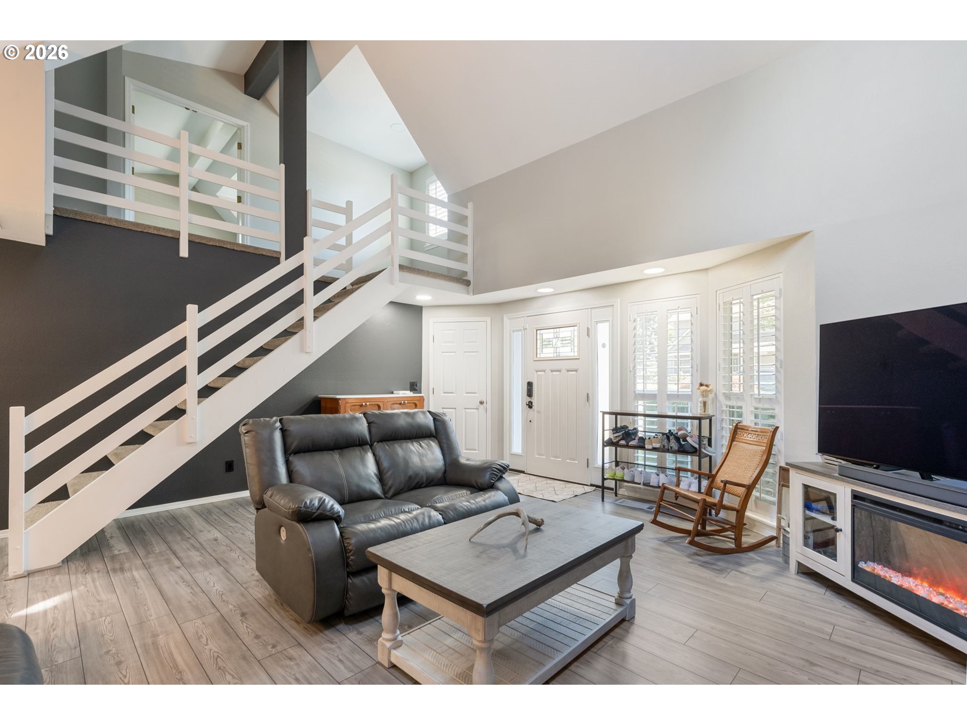 14877 Southwest Oregon Trail Lane Beaverton, OR 97006 - Photo 4 of 41 a living room with furniture and a flat screen tv