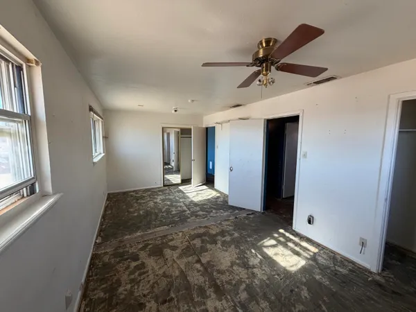 a view of a hallway with front door