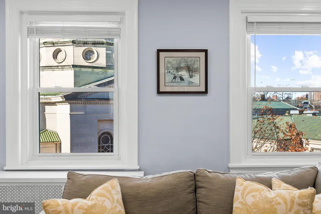 a view of a livingroom with furniture and wooden floor