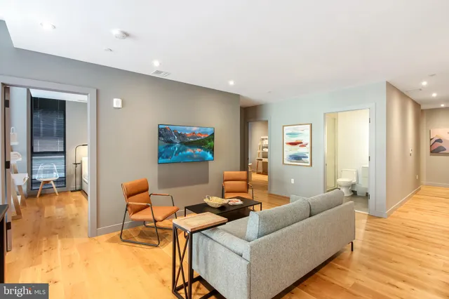 a bedroom with a bed and a cabinets