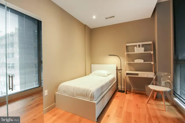 a room with a table and chairs