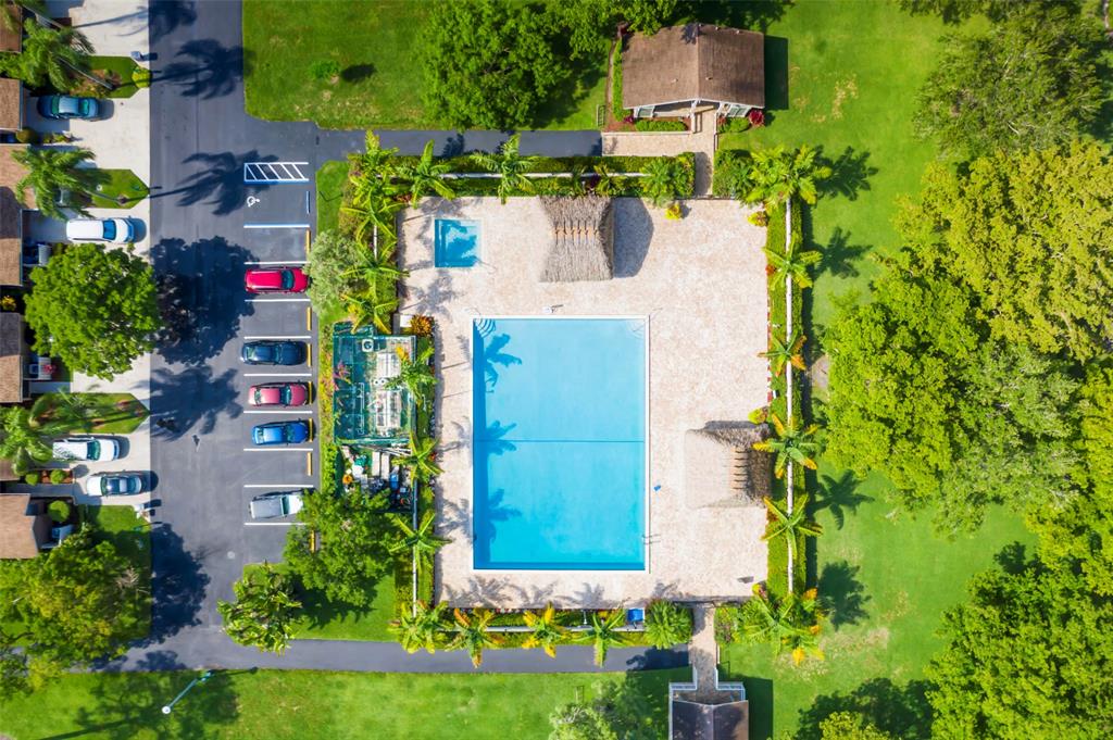 Undisclosed Address Boca Raton, FL 33428 - Photo 3 of 4 an aerial view of a house with a yard and garden