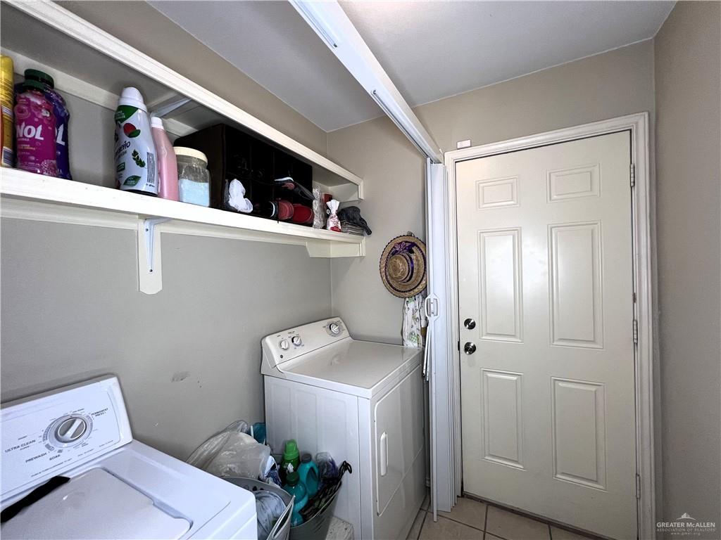613 South Moorefield Road Mission, TX 78572 - Photo 12 of 19 a utility room with dryer and washer