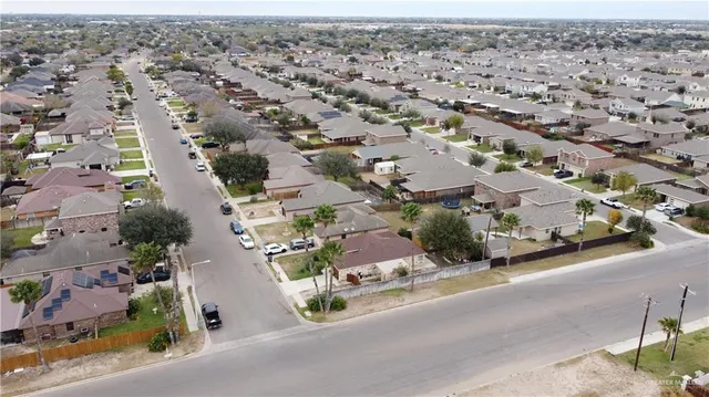 an aerial view of a city with lots of residential buildings