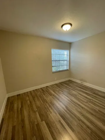 a utility room with washing machine