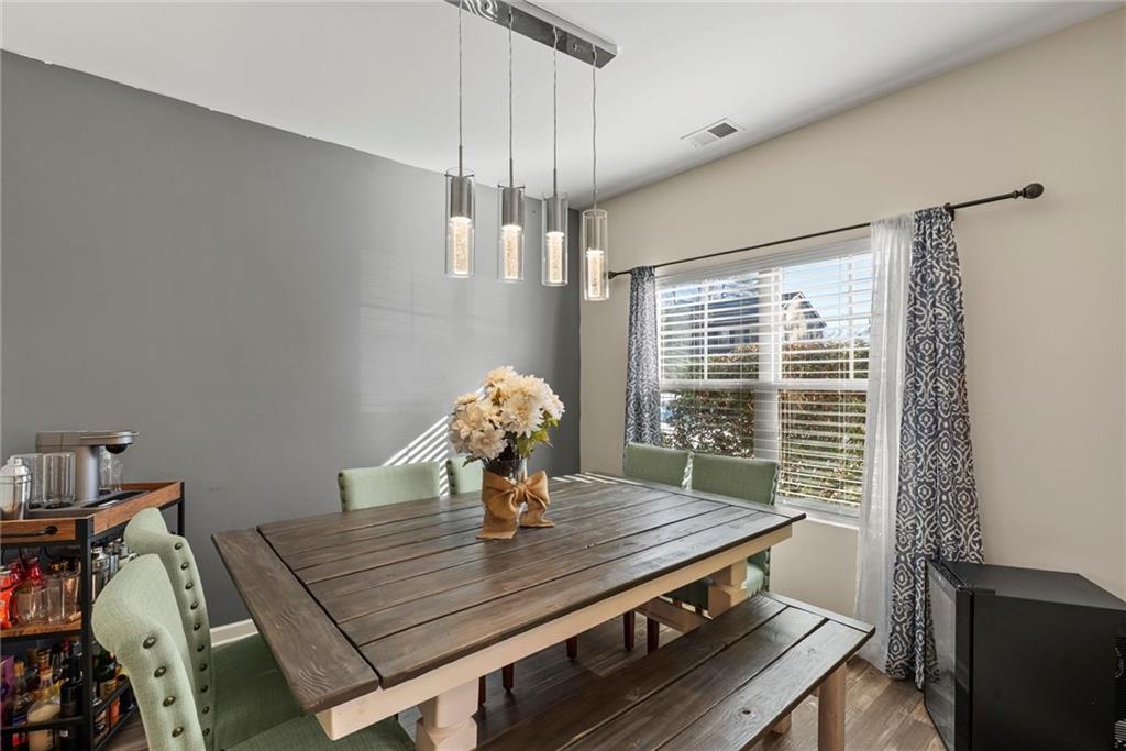 62 Timberland Trace Way Dallas, GA 30157 - Photo 12 of 27 a view of a dining room with furniture window and wooden floor