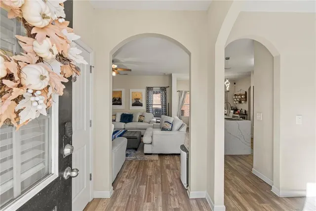 a view of a bedroom from a hallway