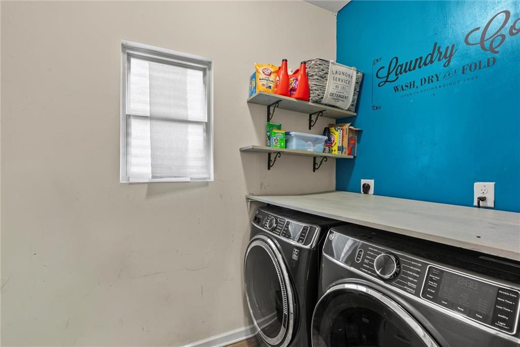 62 Timberland Trace Way Dallas, GA 30157 - Photo 24 of 27 a utility room with dryer and washer