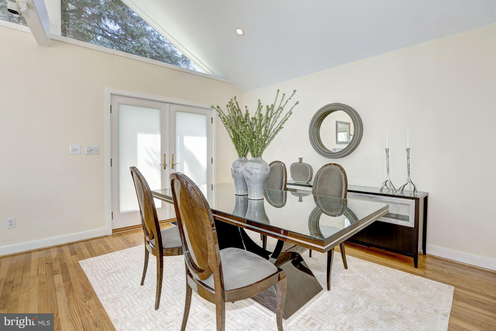6209 Valley Road Bethesda, MD 20817 - Photo 8 of 30 a view of a room that has a table and a chair