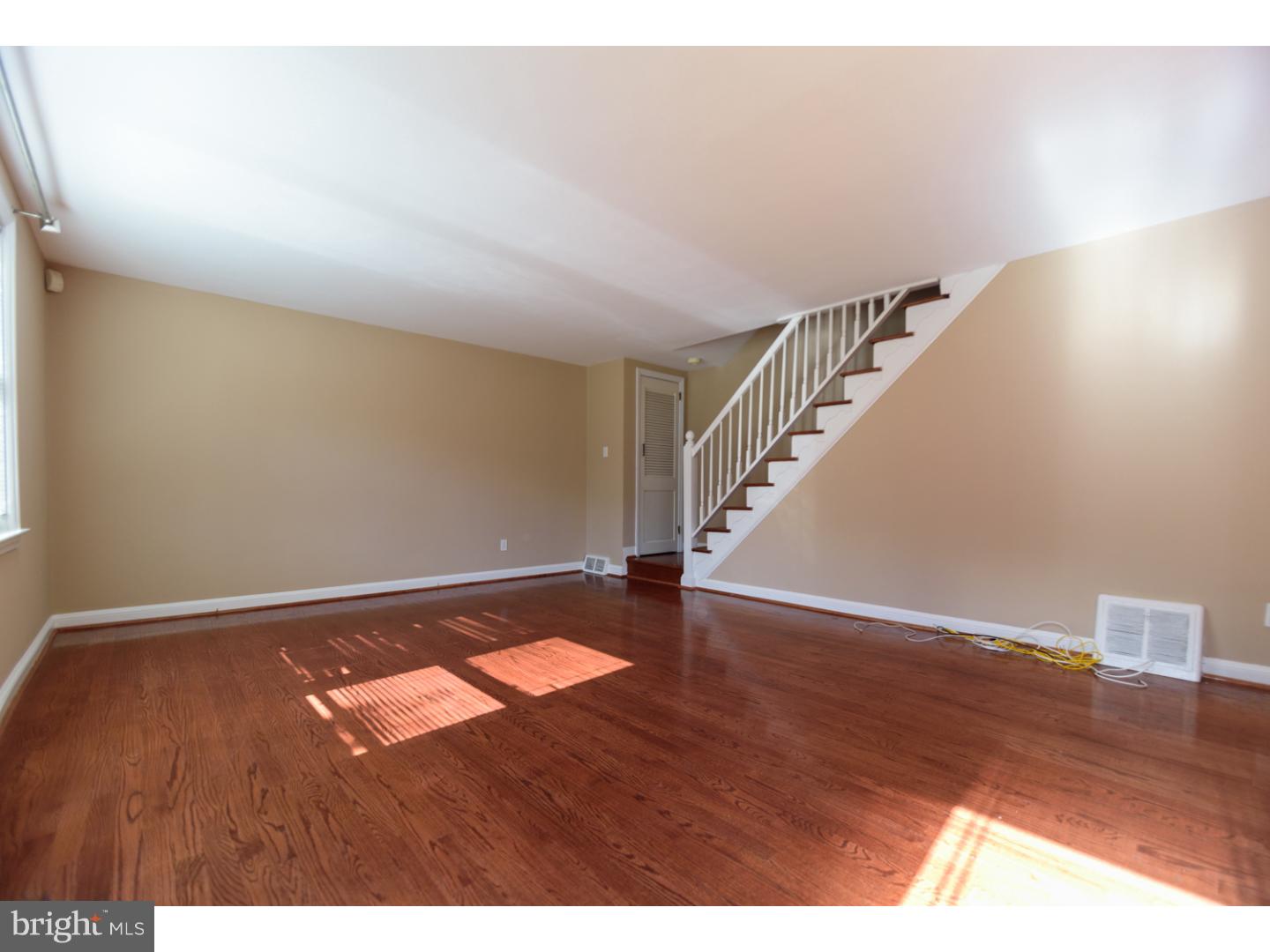 402 Devon Road Havertown, PA 19083 - Photo 3 of 19 a view of an empty room with wooden floor