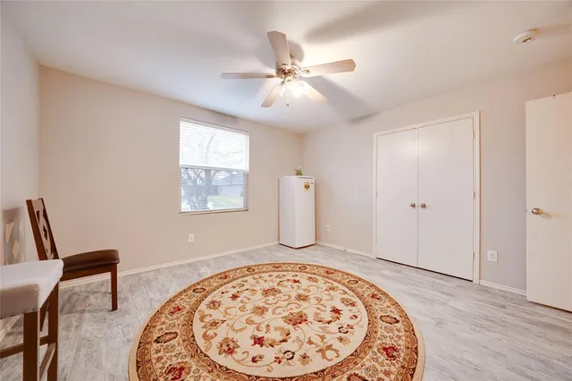 a view of a livingroom with a workspace