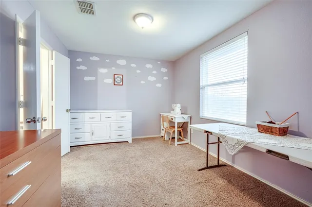 a view of a livingroom with furniture