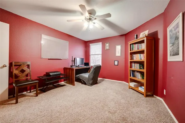 a room with furniture and air hockey table