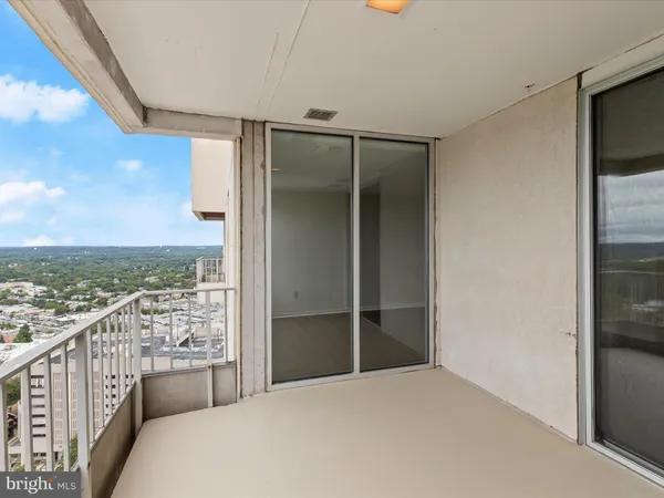 a view of a city from a balcony