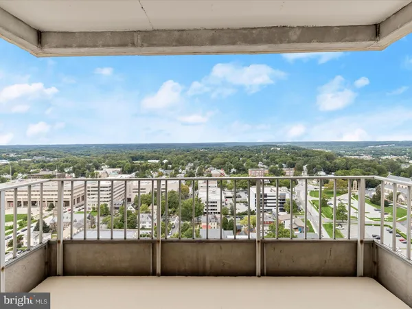 a kitchen with a white cabinets and stainless steel appliances