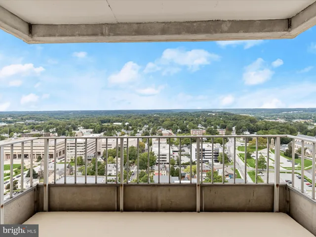 a kitchen with a white cabinets and stainless steel appliances