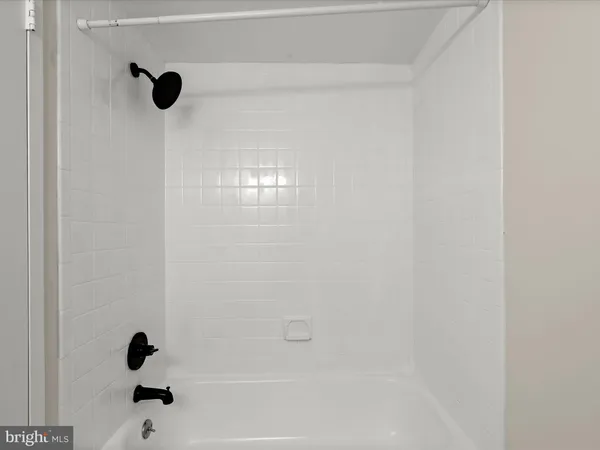 an empty room with closet area