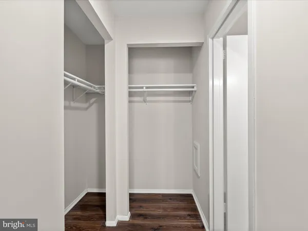 an empty room with entrance door