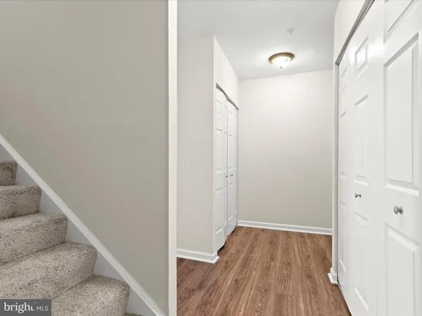 a view of a kitchen from the hallway