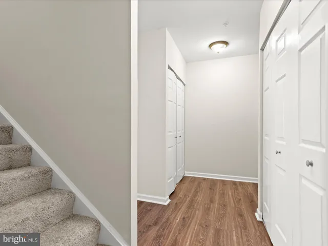 a view of a kitchen from the hallway