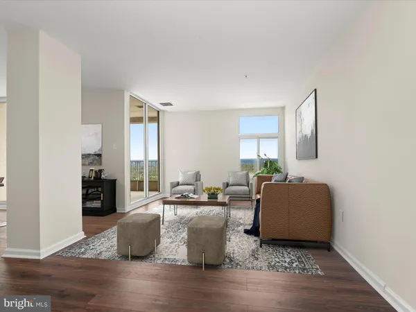 a living room with fireplace furniture and a window