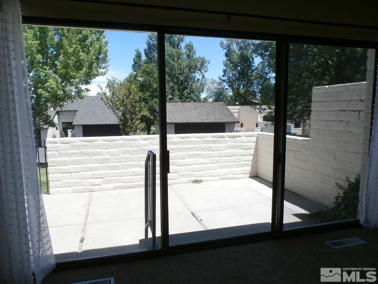 5062 Lakeridge Terrace East Reno, NV 89509 - Photo 8 of 13 a view of a balcony with a tree