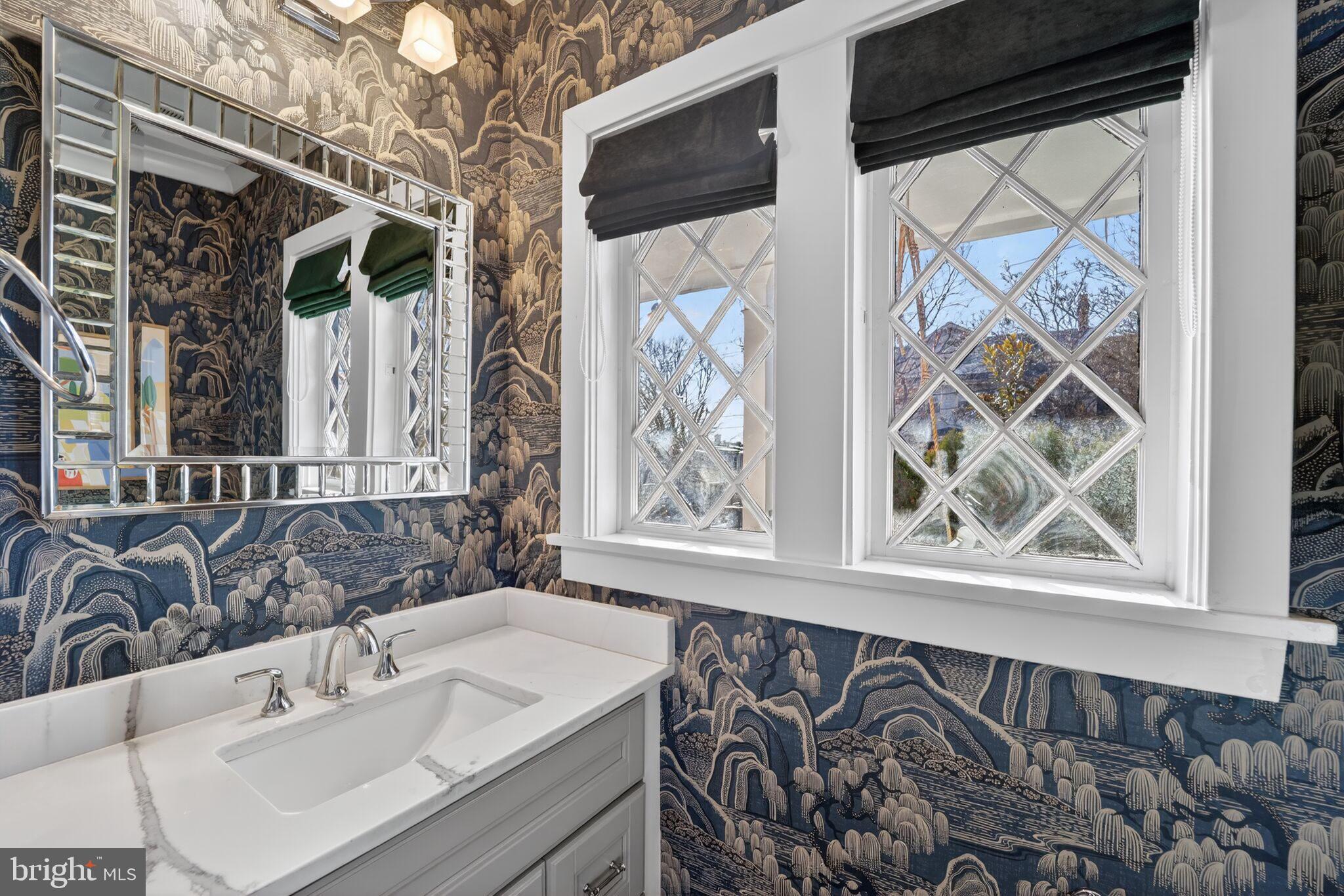 1507 Decatur Street Northwest Washington, DC 20011 - Photo 12 of 30 a bathroom with a sink and a mirror