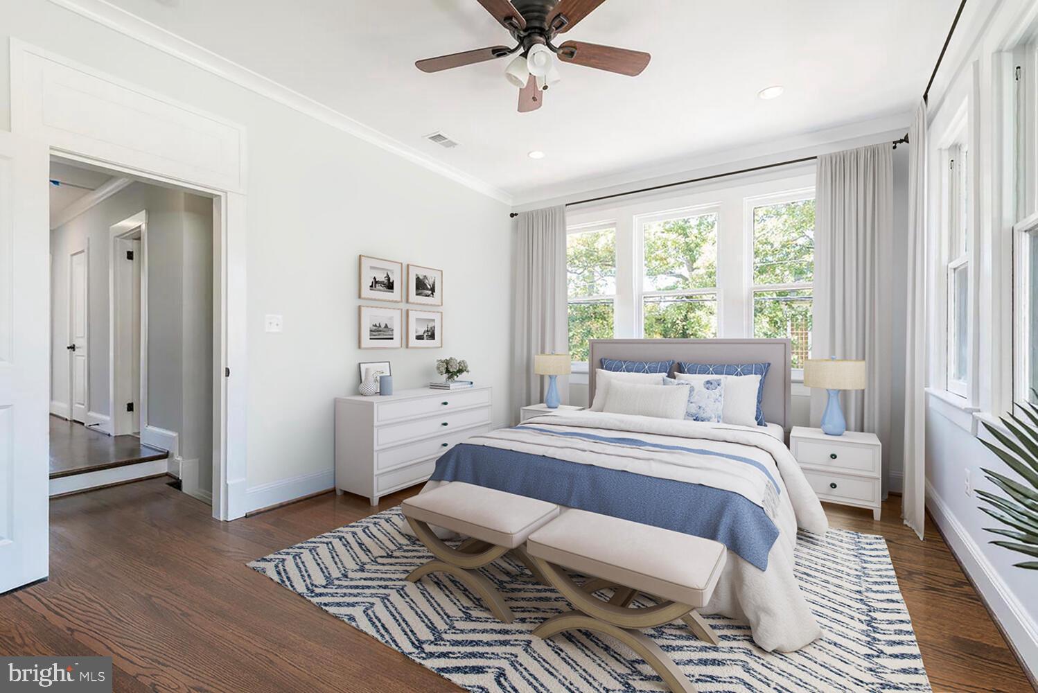 1507 Decatur Street Northwest Washington, DC 20011 - Photo 13 of 30 a bedroom with a large bed and a window