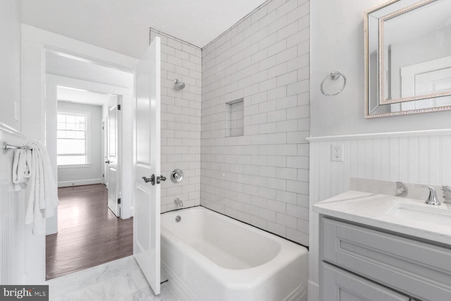 1507 Decatur Street Northwest Washington, DC 20011 - Photo 18 of 30 a bathroom with a bathtub and a sink