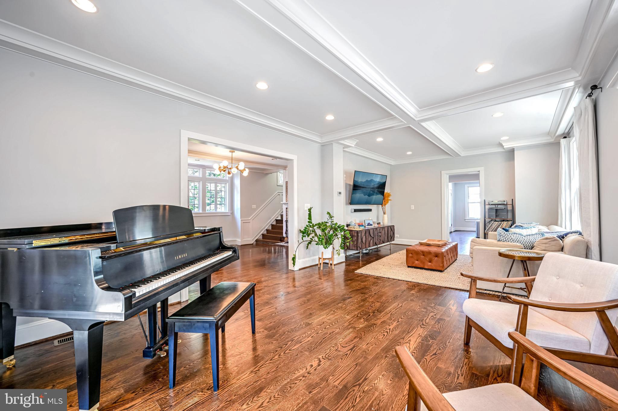 1507 Decatur Street Northwest Washington, DC 20011 - Photo 6 of 30 a living room with furniture a rug and a piano