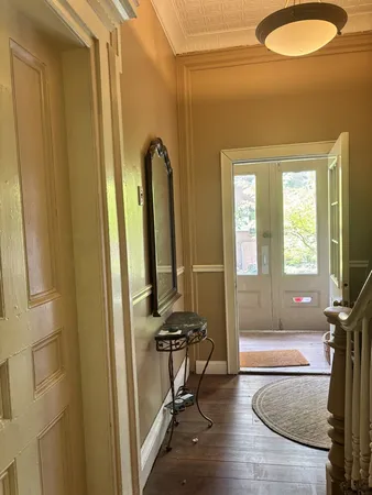 a view of a livingroom with furniture and windows