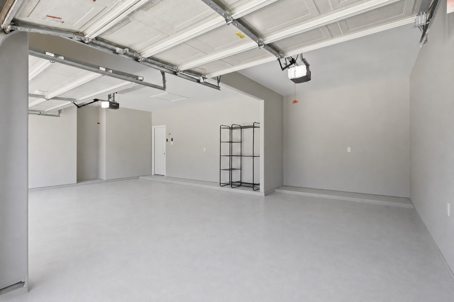 25926 Morgan Springs Spring, TX 77373 - Photo 37 of 49 Another view of the spacious three-car garage showcases the abundant room for vehicles, storage, tools, and hobbies, offering exceptional functionality to accommodate your everyday needs.