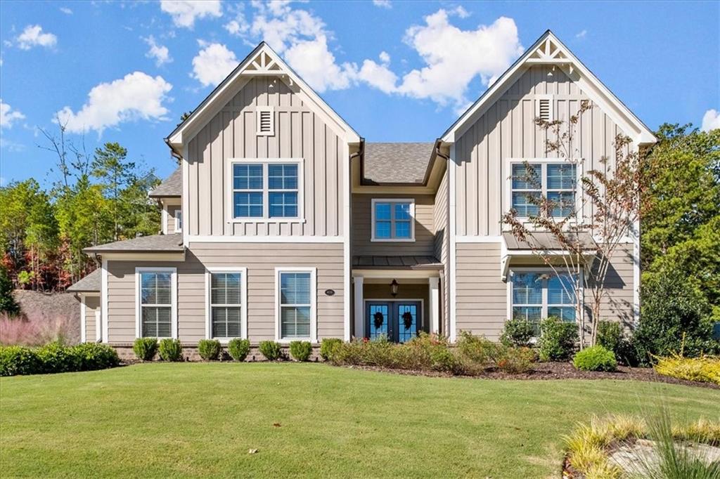 409 Parkbrook Way Canton, GA 30114 - Photo 1 of 1 front view of a house with a yard