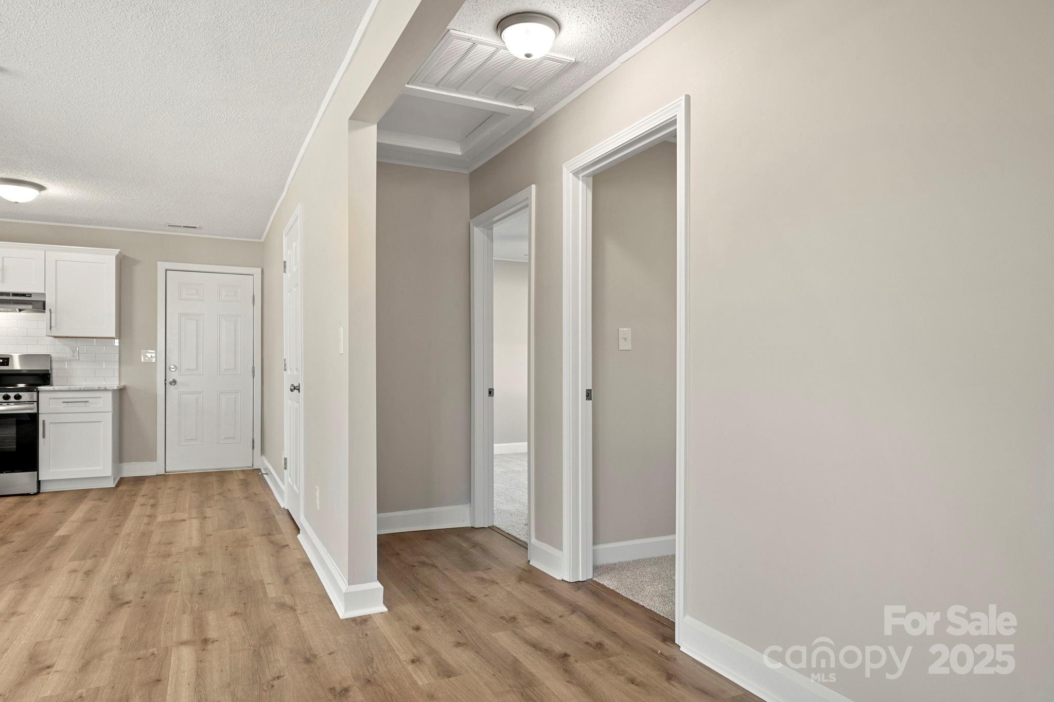 1421 North Post Road Shelby, NC 28150 - Photo 21 of 34 a view of a hallway with wooden floor