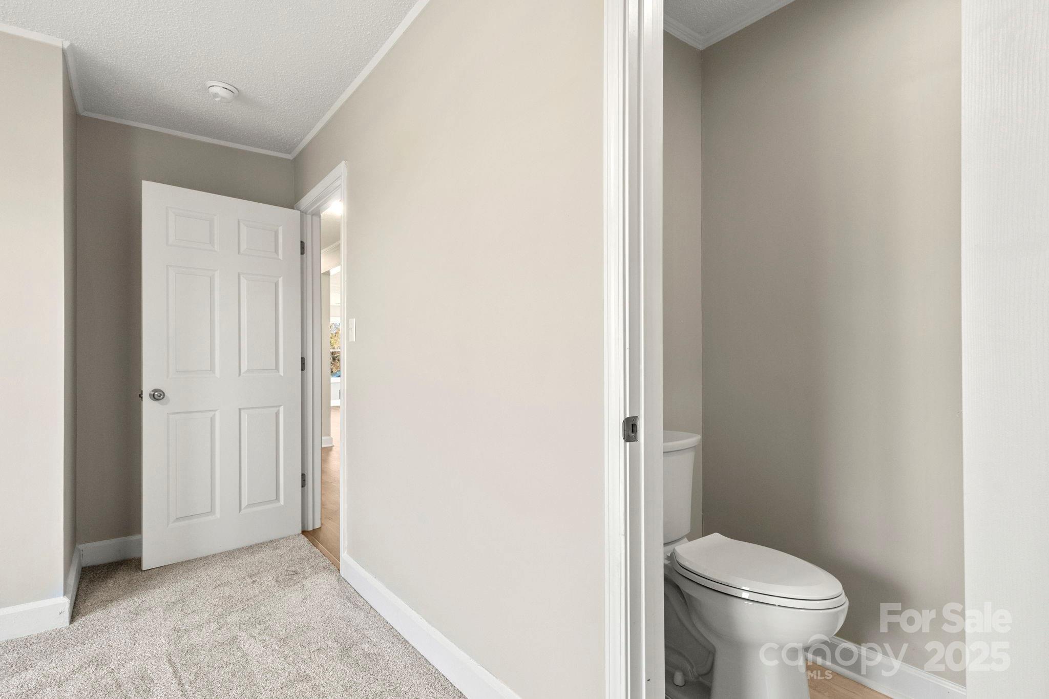 1421 North Post Road Shelby, NC 28150 - Photo 24 of 34 a bathroom with a granite countertop toilet and a sink