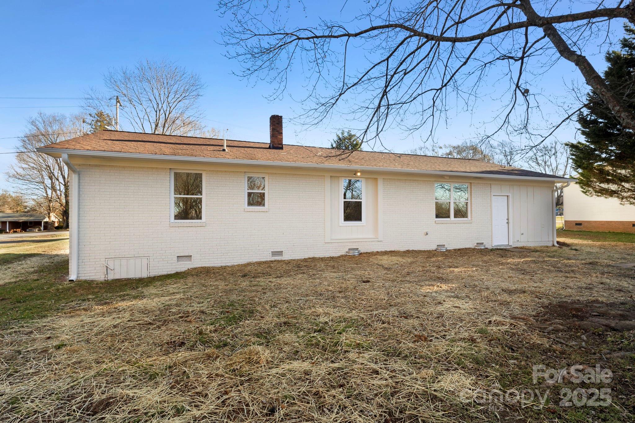 1421 North Post Road Shelby, NC 28150 - Photo 8 of 34 a view of a house with a backyard