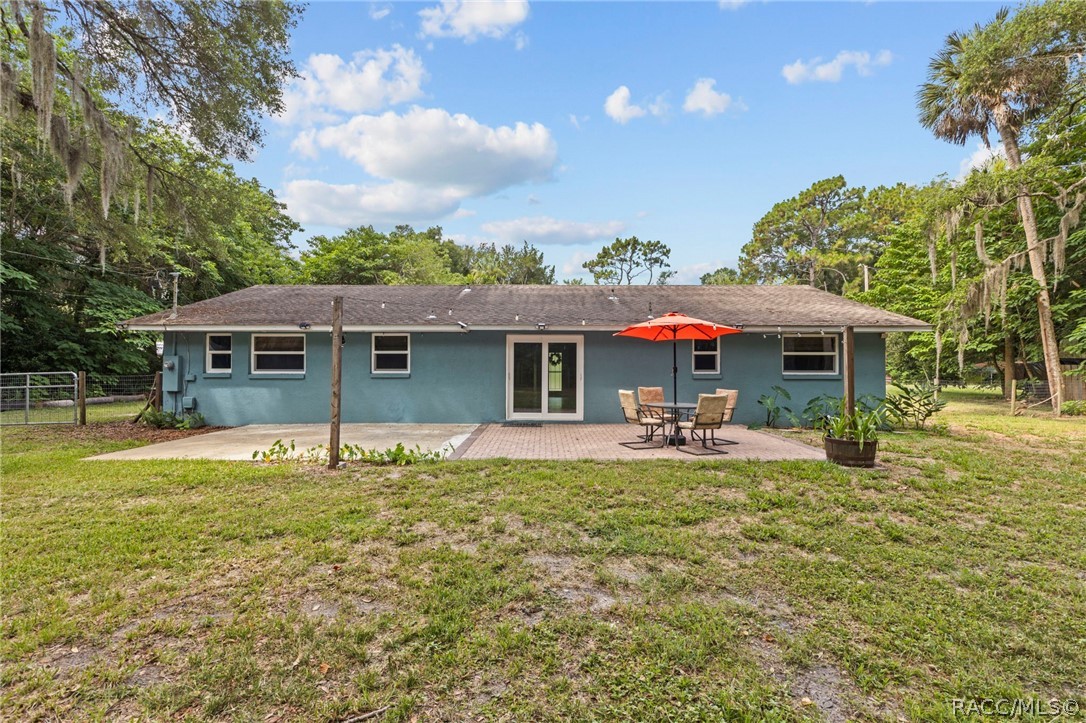 107 Allen Avenue Inglis, FL 34449 - Photo 24 of 36 a view of a house with swimming pool and sitting area