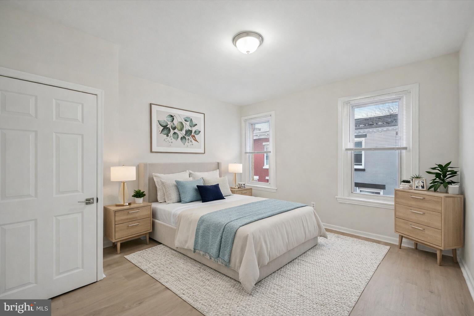 2457 North Patton Street Philadelphia, PA 19132 - Photo 13 of 23 a bedroom with a bed and a couch