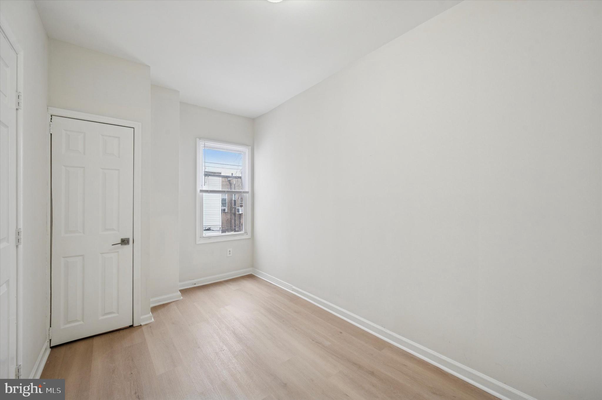2457 North Patton Street Philadelphia, PA 19132 - Photo 14 of 23 a view of an empty room and wooden floor
