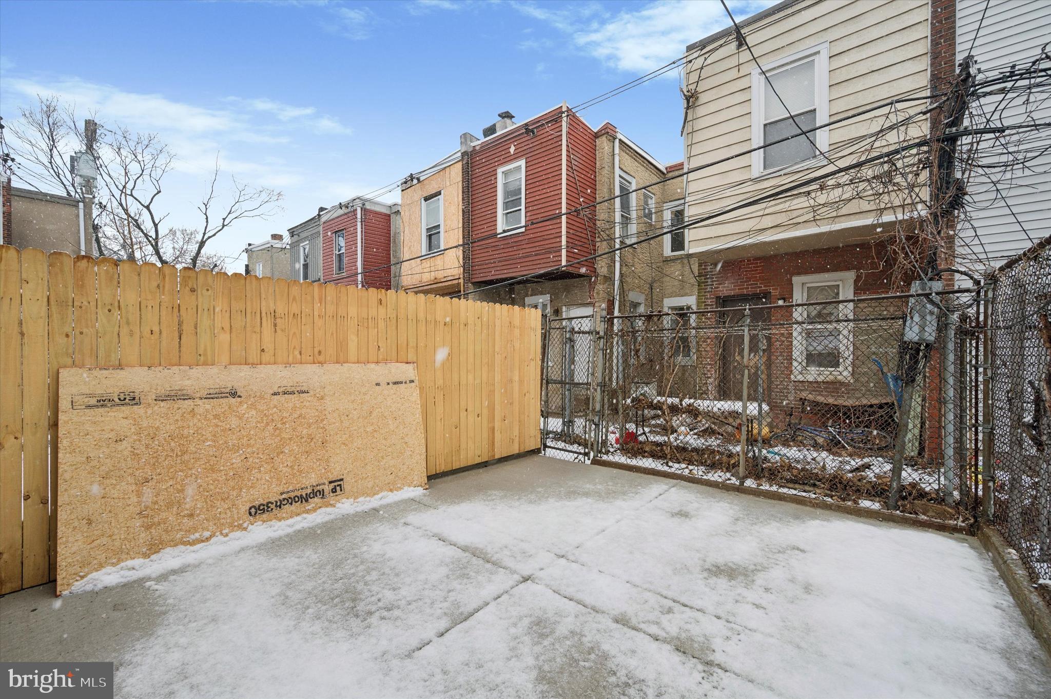 2457 North Patton Street Philadelphia, PA 19132 - Photo 22 of 23 a view of a brick house with many windows